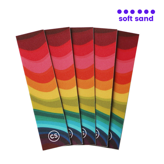 There is a photo of five textured stickers. They are coloured in the pattern of the rainbow with “cs” at the bottom. It says “soft sand” in the upper right corner.