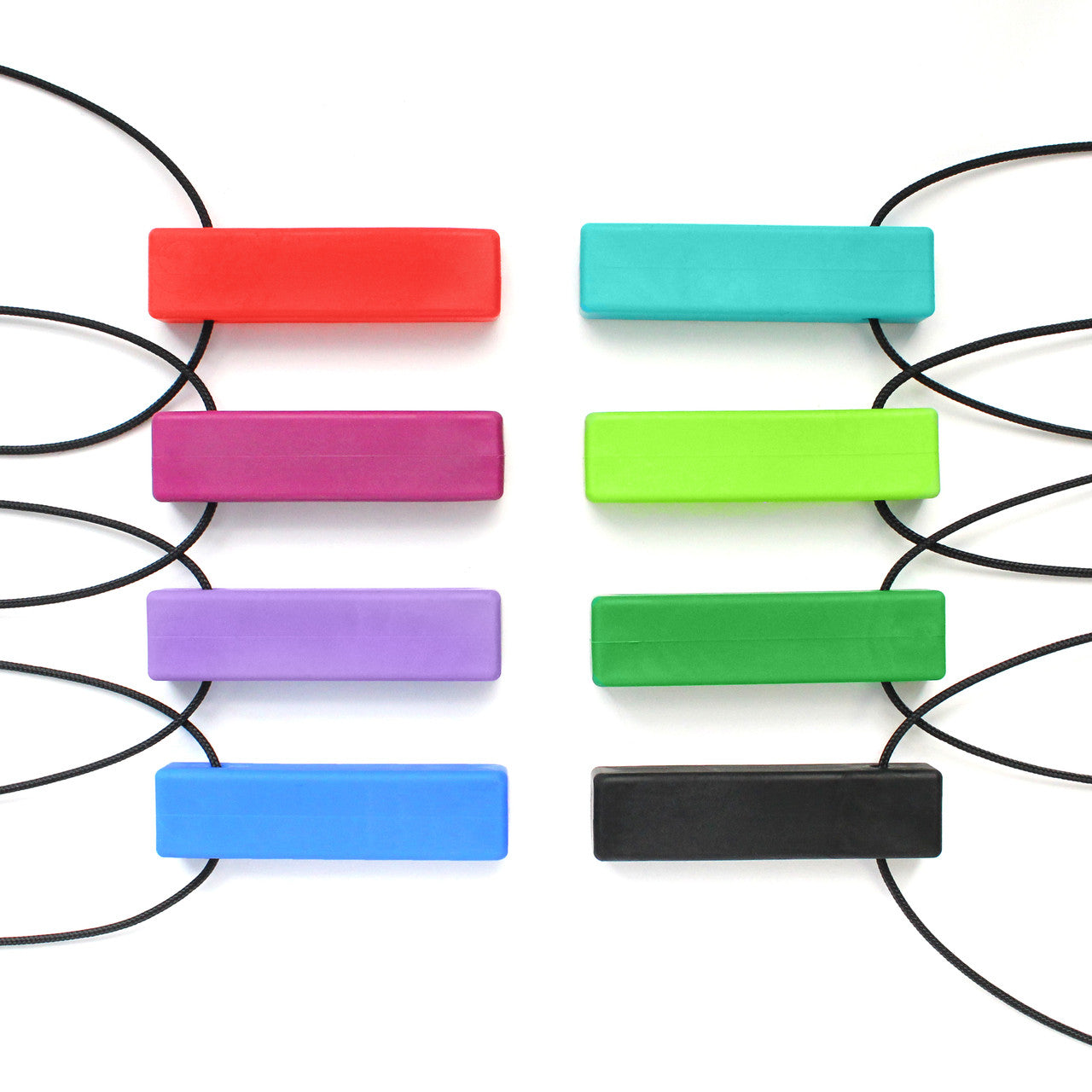 There are eight smooth brick chew necklaces. There are four on each side. On the right side, the colours are: red, magenta, lavendar, and blue. On the left there are: teal, lime green, green and black.