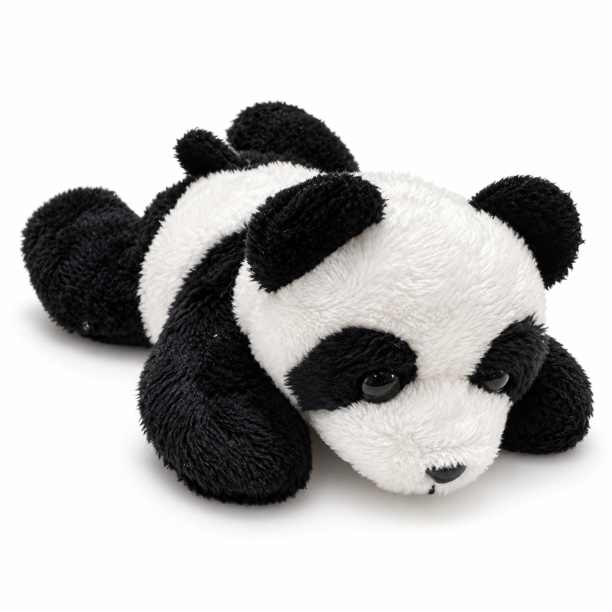 A black and white plush panda toy lying on its side on a clean white background.