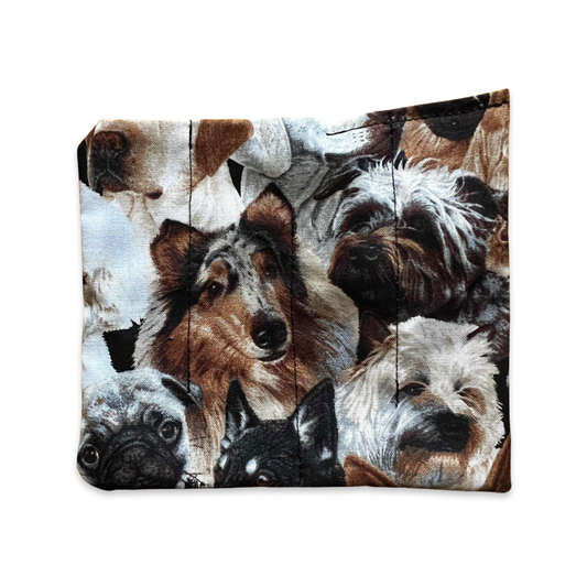 Handheld marble maze with a clear panel and dog-themed design.