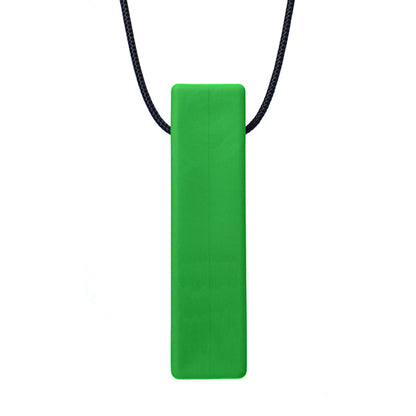 There is a smooth brick shaped pendant on a black cord. The pendant is green coloured and designed to be chewed on. 