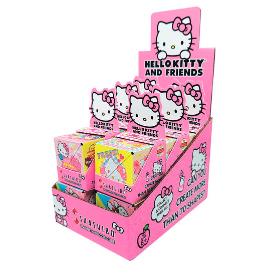 Display of Hello Kitty and Friends Shashibo magnetic puzzle cubes in pink packaging, featuring foldable cubes that transform into multiple shapes