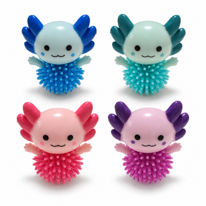 Four small axolotl-shaped toys arranged in a 2x2 grid on a white background. Each toy has a cute cartoon face and a spiky body in blue, teal, pink, and purple.