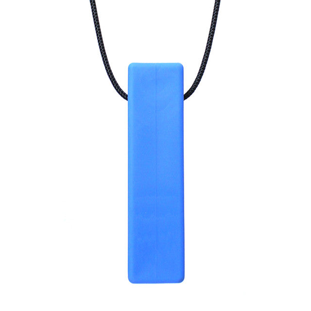 There is a smooth brick shaped pendant on a black cord. The pendant is royal blue coloured and designed to be chewed on. 