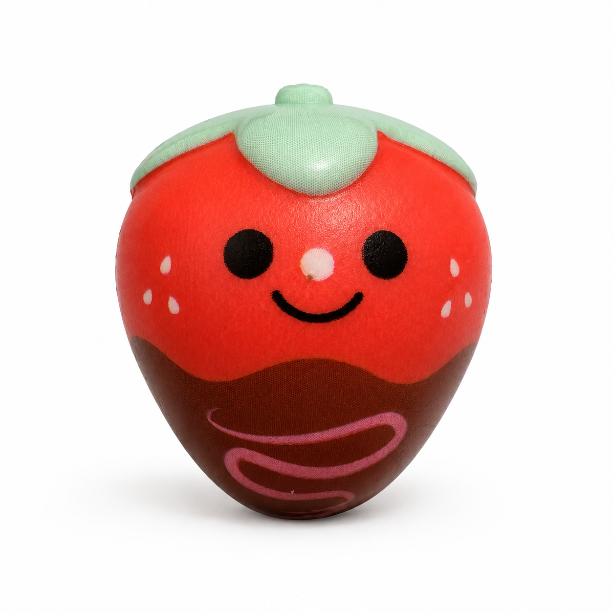 Small red strawberry squishy with a pale green leafy top, smiling face, white seed details, and a chocolate-dipped bottom decorated with pink drizzle, shown upright against a white background.